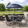 Eito 4-Piece Outdoor Dining Set with umbrella